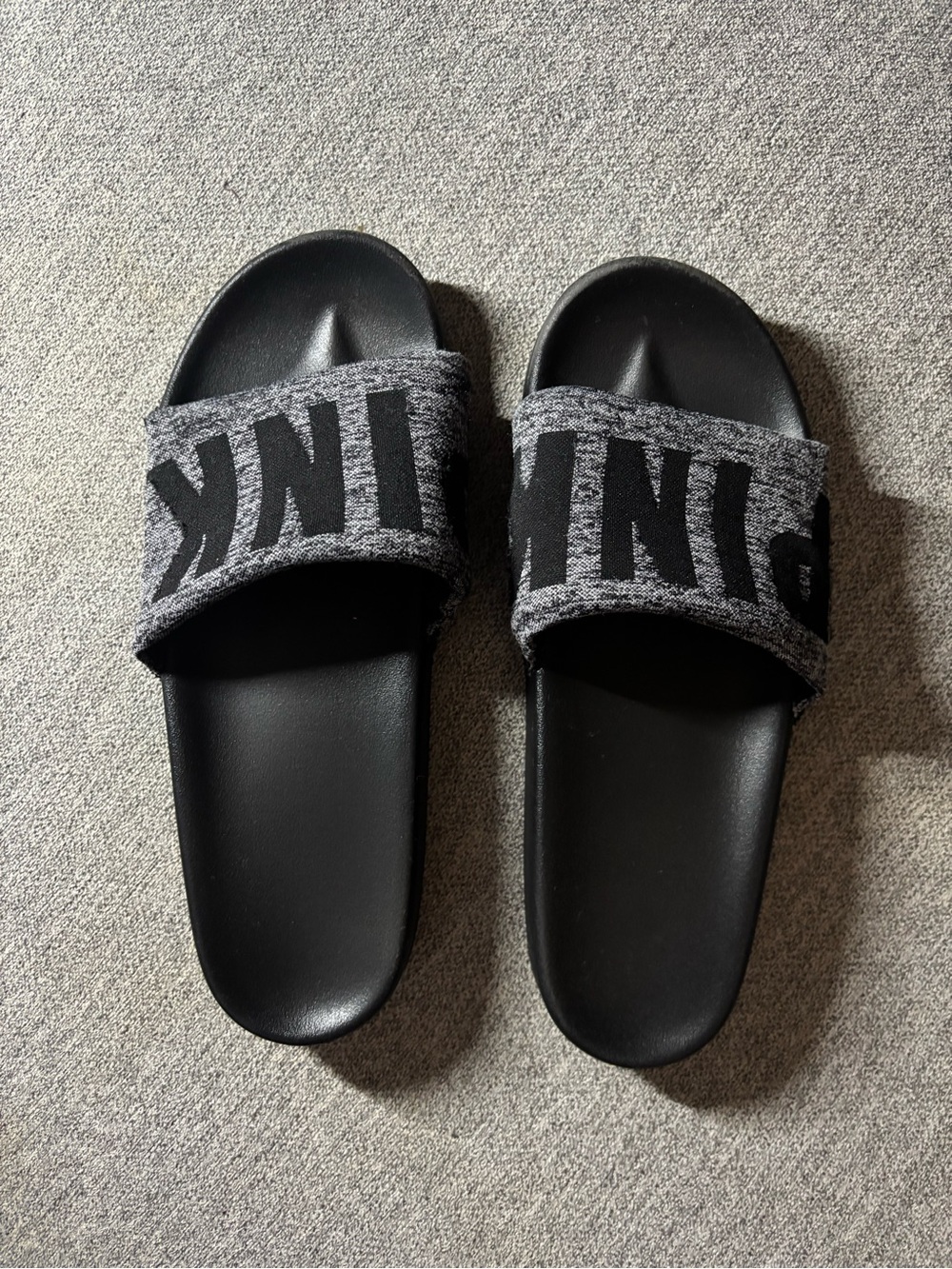 Women’s Victoria secret pink slides.